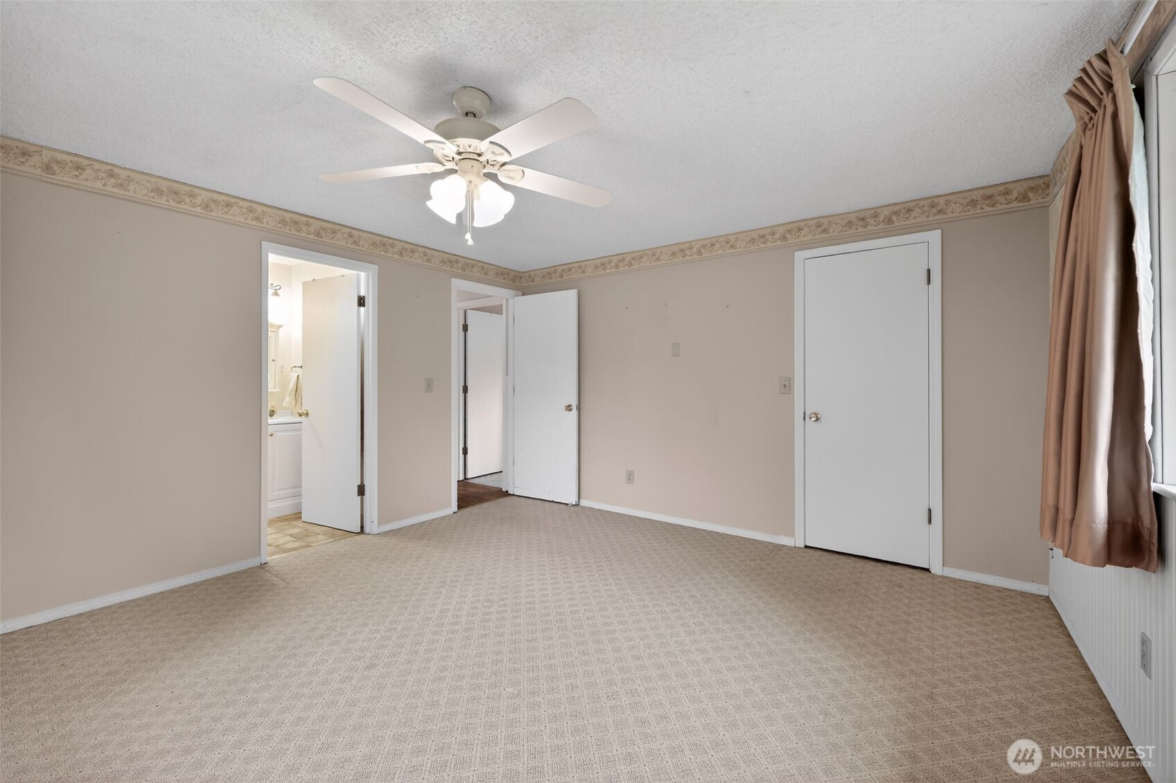 271 Hawkins Road Winlock, WA 98596 - Photo 20 of 26 a view of an empty room with a window