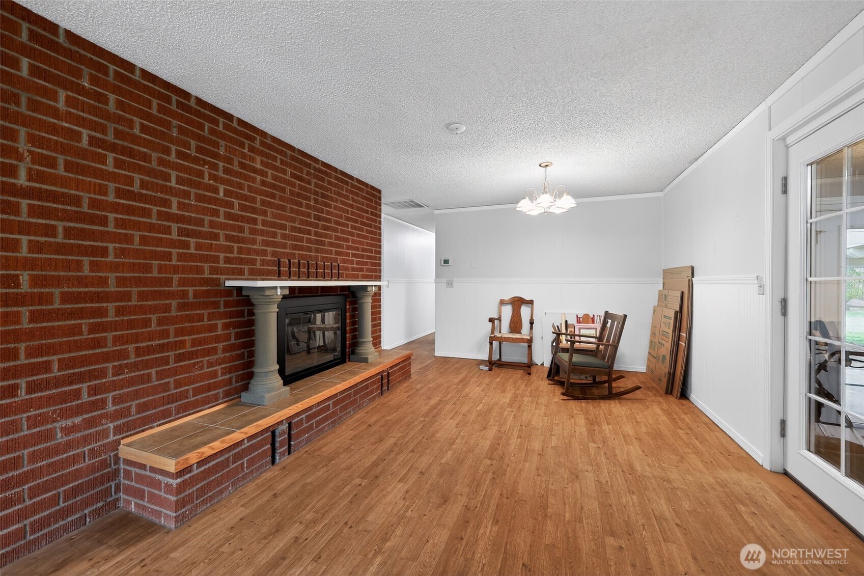271 Hawkins Road Winlock, WA 98596 - Photo 4 of 26 a view of a livingroom with furniture and a fireplace