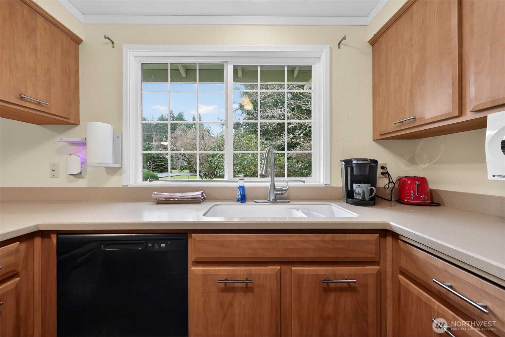 271 Hawkins Road Winlock, WA 98596 - Photo 9 of 26 a kitchen with stainless steel appliances granite countertop a sink a window and cabinets
