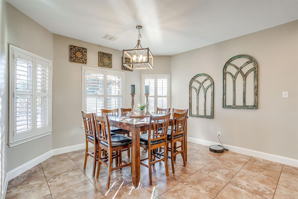 1249 Handkerchief Way Fort Worth, TX 76052 - Photo 14 of 40 a view of a dining room with furniture window and outside view