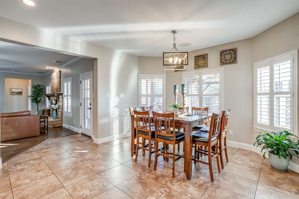 1249 Handkerchief Way Fort Worth, TX 76052 - Photo 15 of 40 a view of a dining room with furniture