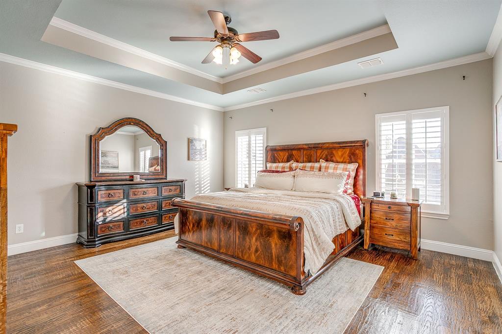 1249 Handkerchief Way Fort Worth, TX 76052 - Photo 16 of 40 a bed sitting in a spacious bedroom next to a window