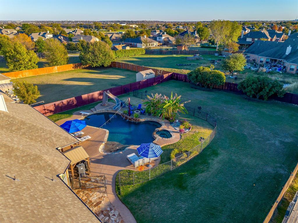 1249 Handkerchief Way Fort Worth, TX 76052 - Photo 34 of 40 an aerial view of a house with a garden