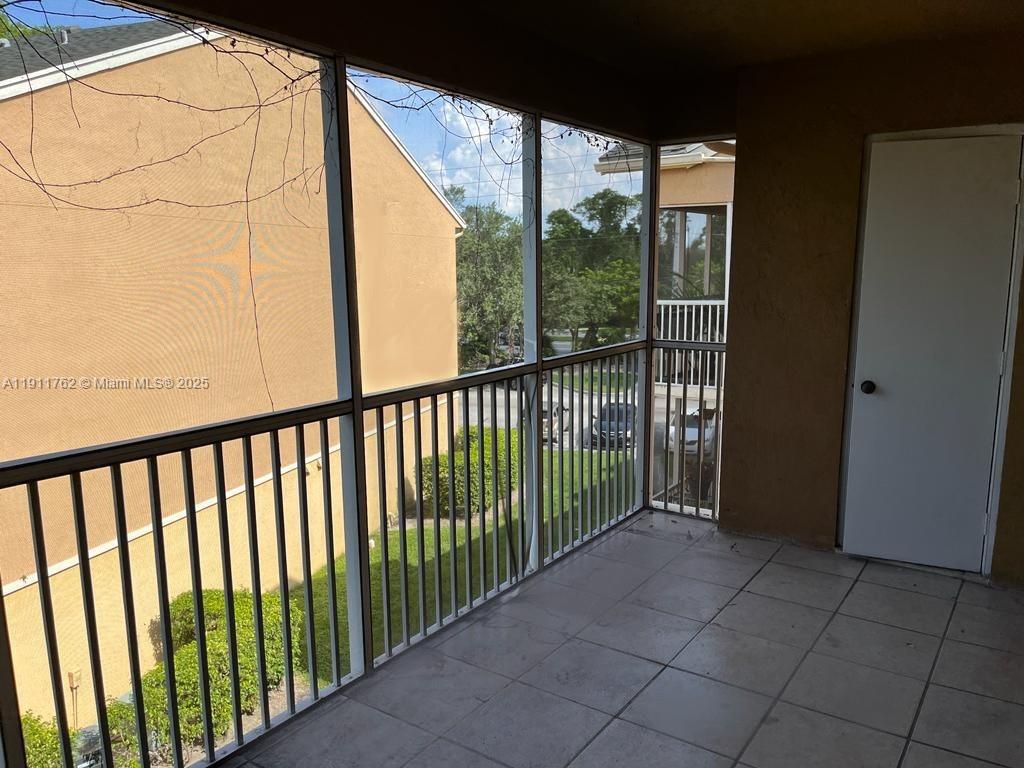 4015 West McNab Road, Unit D308 Pompano Beach, FL 33069 - Photo 12 of 17 a view of a balcony