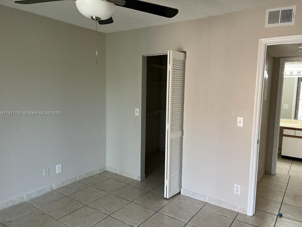 4015 West McNab Road, Unit D308 Pompano Beach, FL 33069 - Photo 10 of 17 a view of an empty room