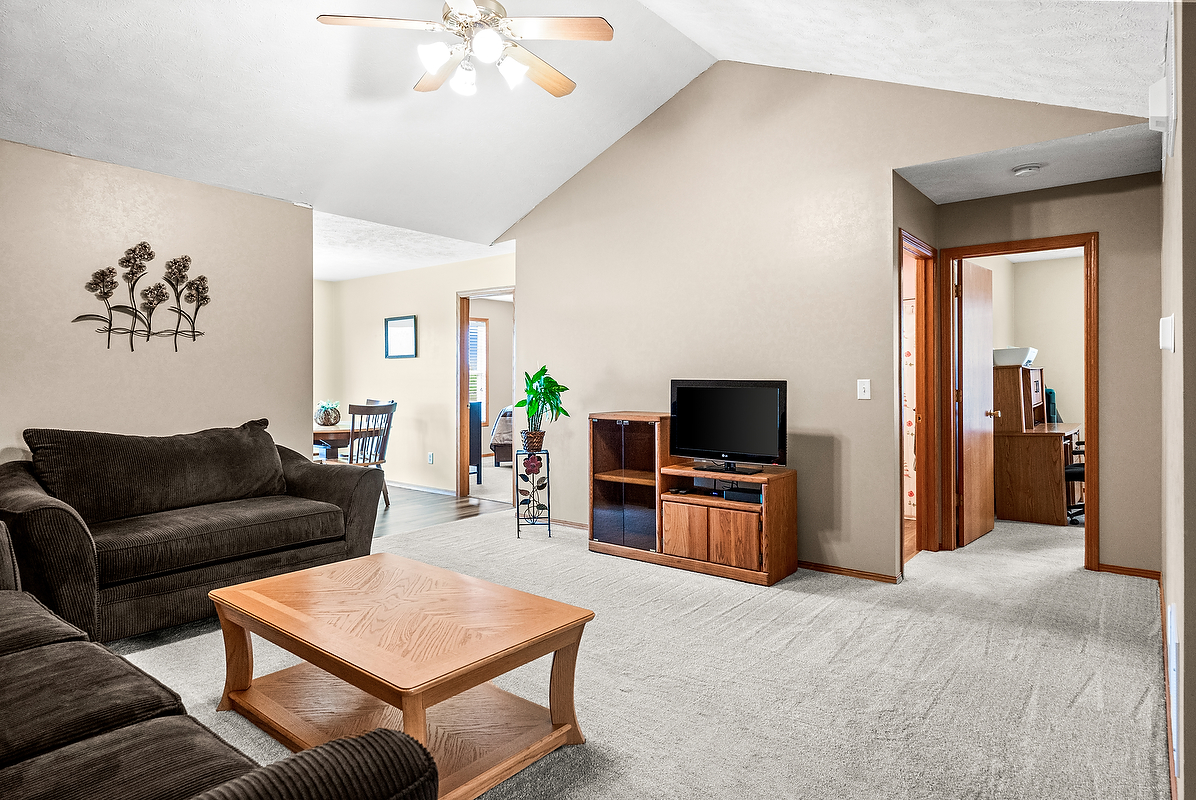 2009 Marina Drive Normal, IL 61761 - Photo 2 of 15 a living room with furniture and a flat screen tv