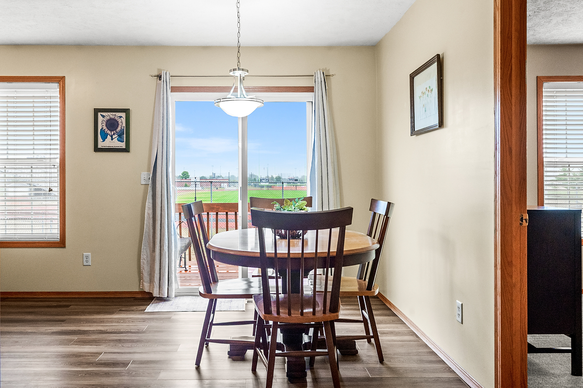 2009 Marina Drive Normal, IL 61761 - Photo 7 of 15 a view of a dining room with furniture window and wooden floor