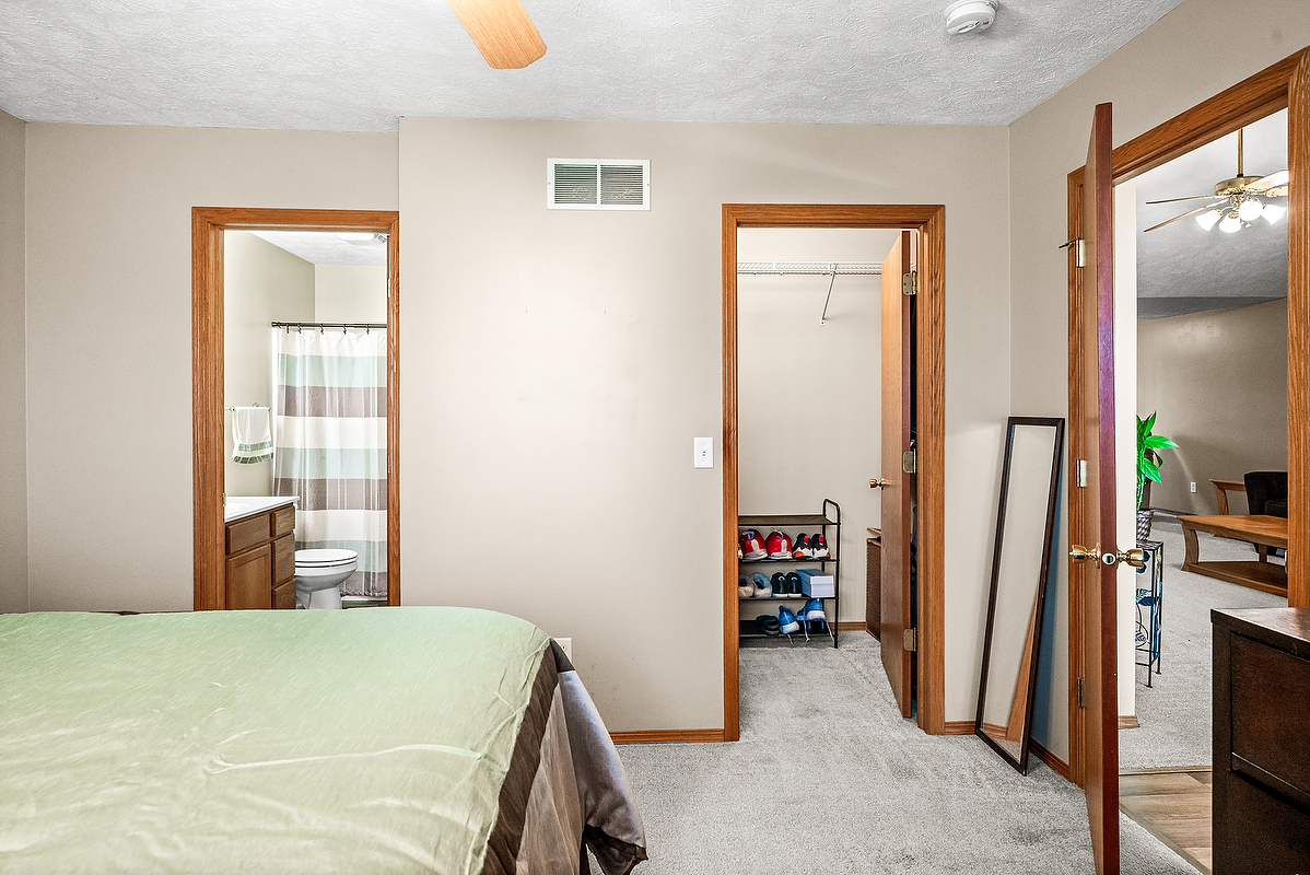 2009 Marina Drive Normal, IL 61761 - Photo 10 of 15 a bedroom with a bed and a flat tv screen