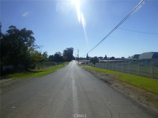 a view of a swimming pool with a yard
