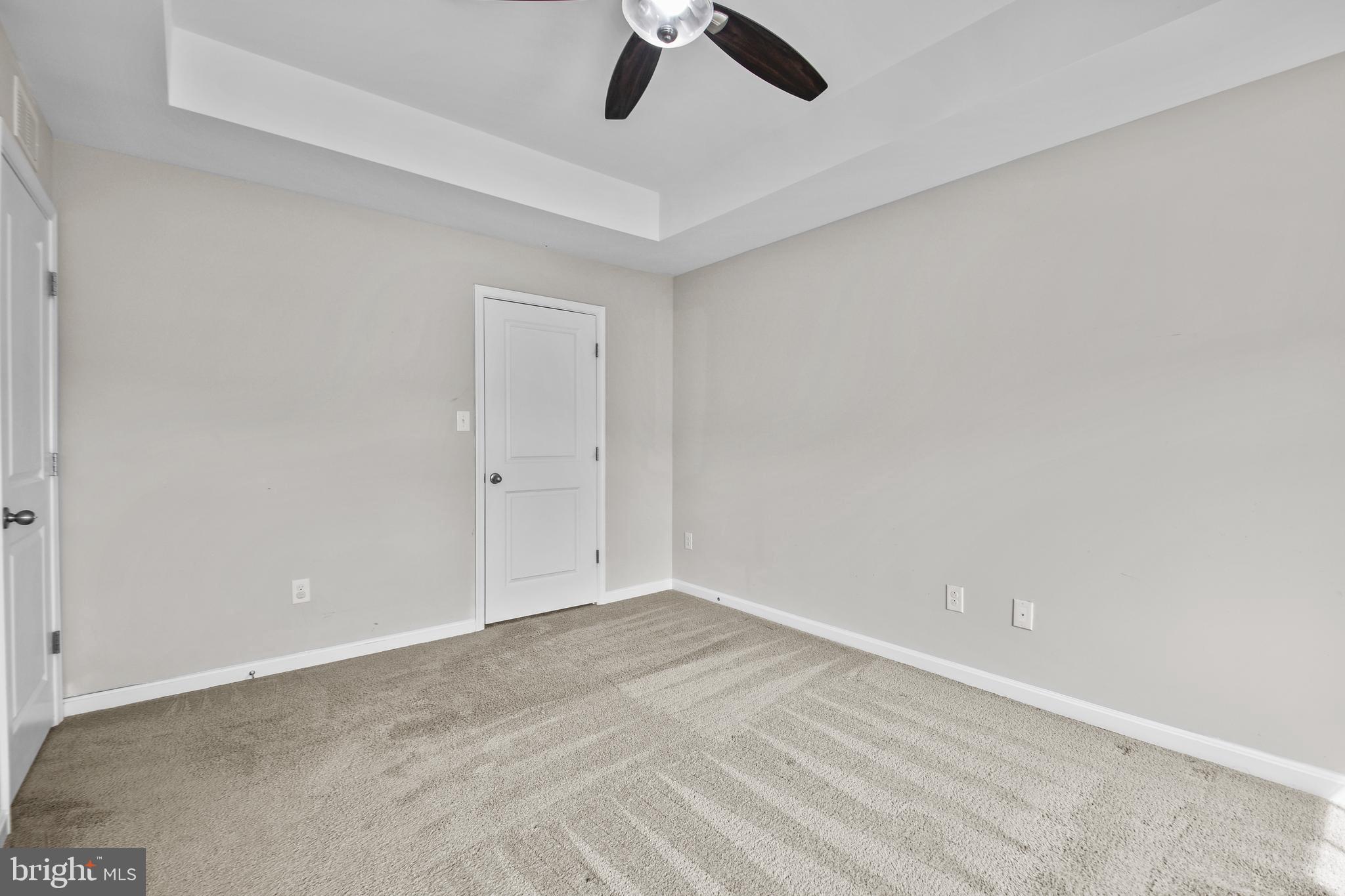 4648 Cambria Road Frederick, MD 21703 - Photo 11 of 22 an empty room with ceiling fan and window