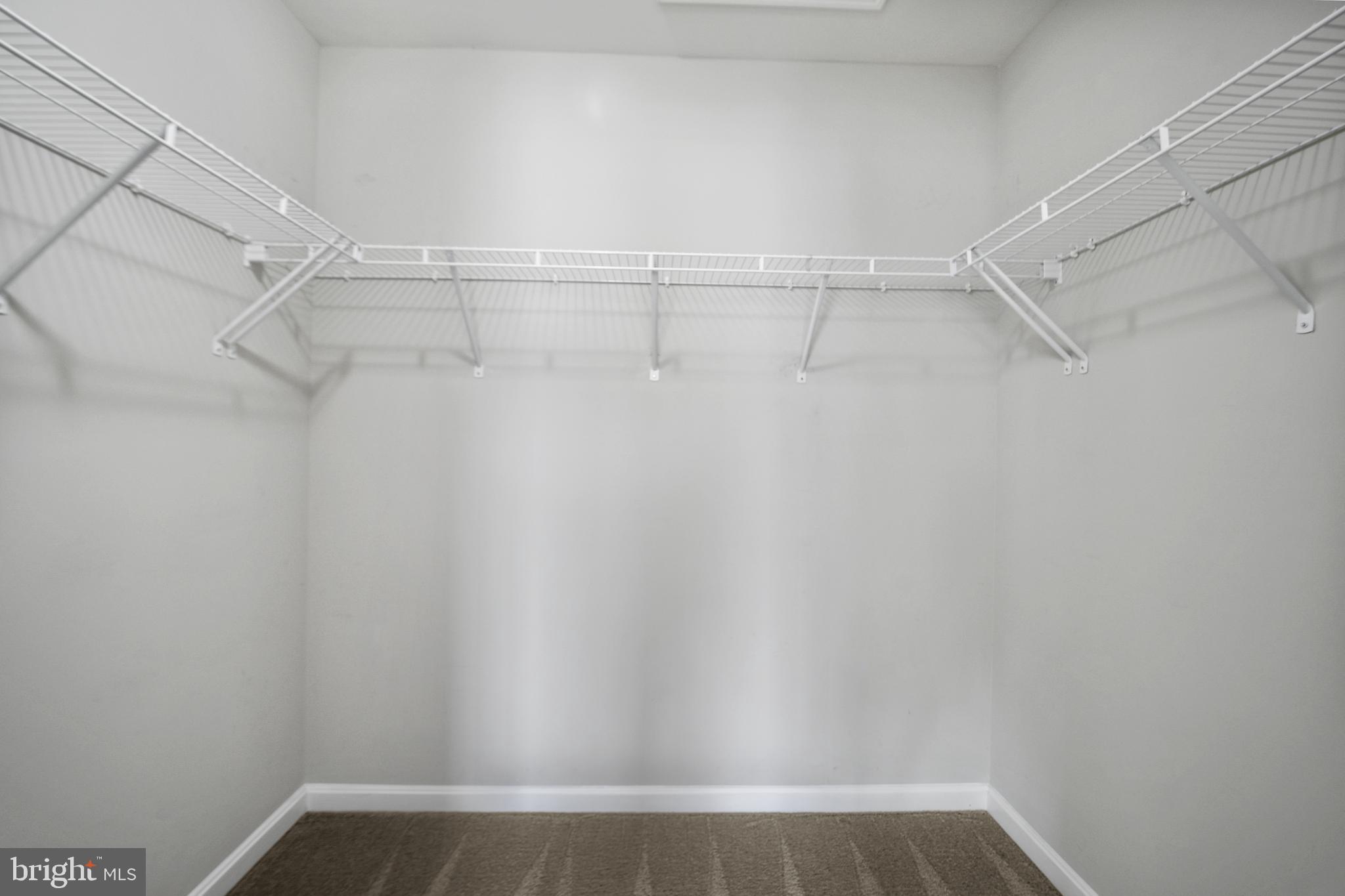 4648 Cambria Road Frederick, MD 21703 - Photo 12 of 22 a view of a room with racks on the wall