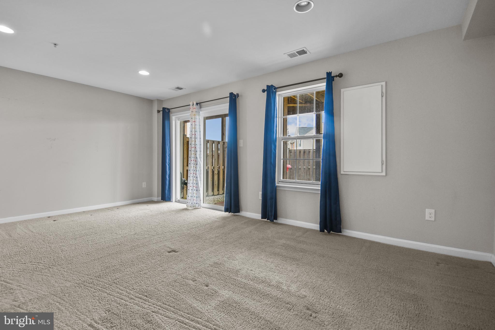 4648 Cambria Road Frederick, MD 21703 - Photo 19 of 22 a view of a big room with windows and closet