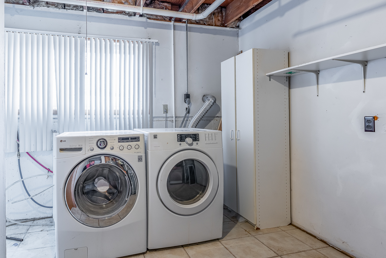 4905 50th Street Moline, IL 61265 - Photo 25 of 25 a utility room with dryer and washer