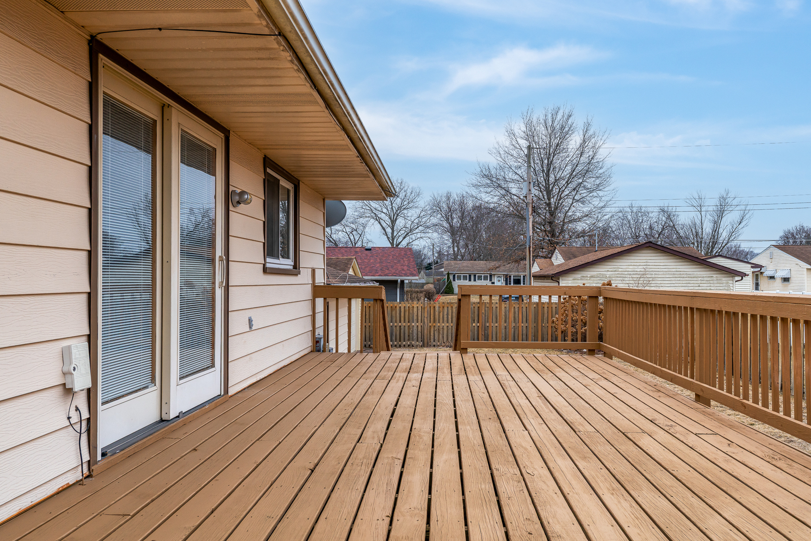 4905 50th Street Moline, IL 61265 - Photo 7 of 25 a view of a balcony with wooden floor