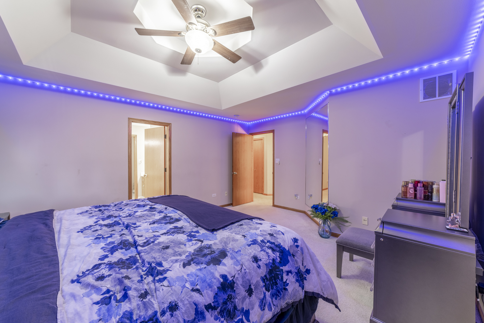 1071 Yamma Ridge New Lenox, IL 60451 - Photo 25 of 51 a bedroom with a bed and a chandelier