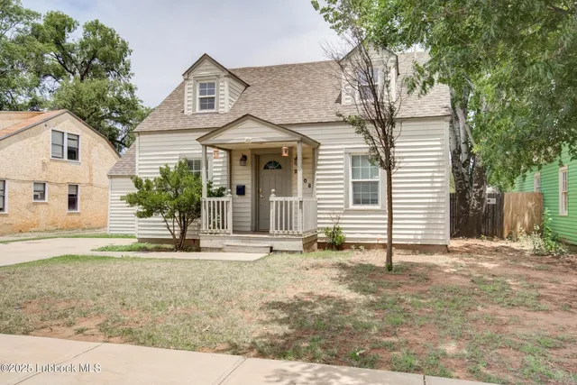 front view of a house with a trees