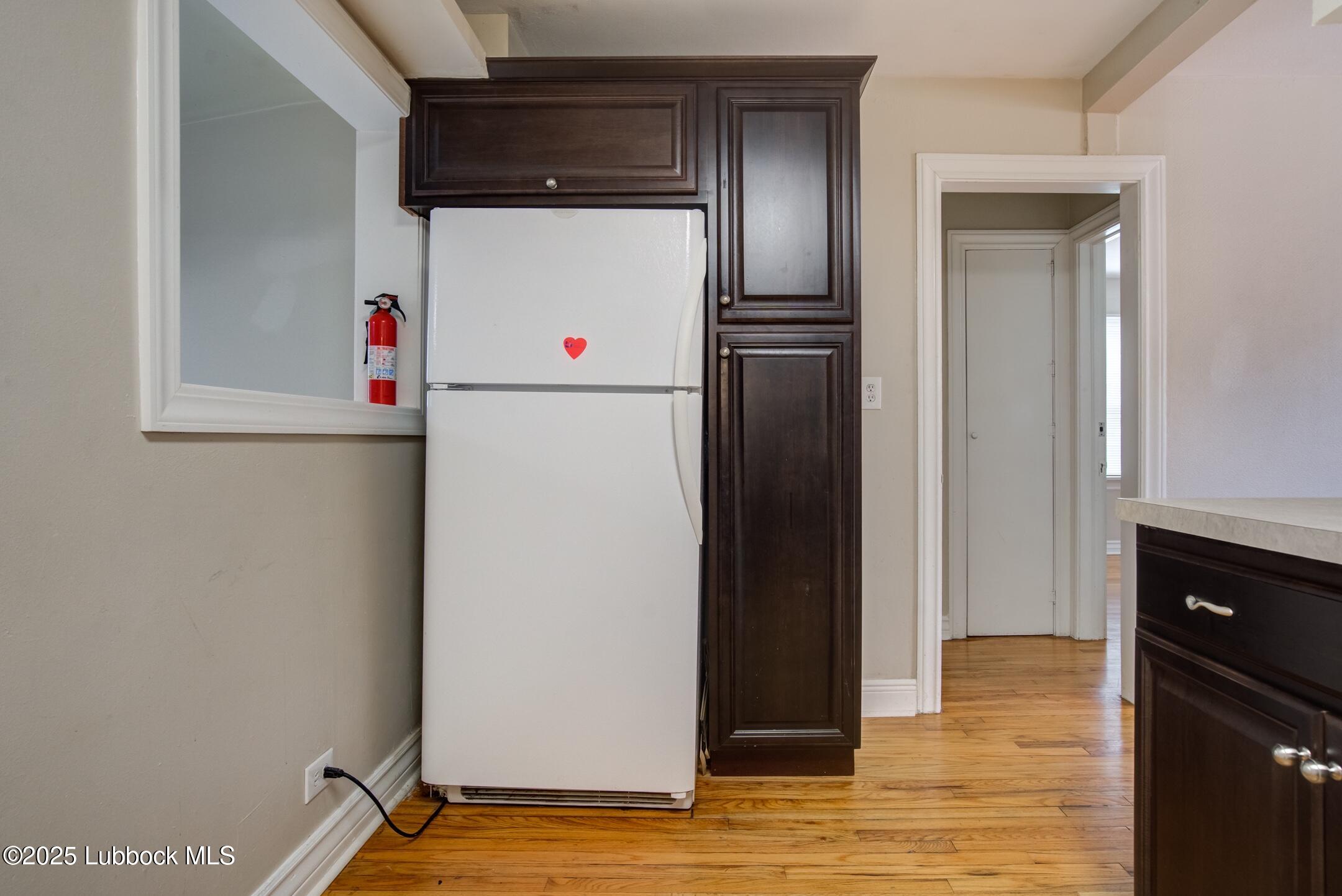 2308 28th Street Lubbock, TX 79411 - Photo 3 of 21 a utility room with dryer and washer