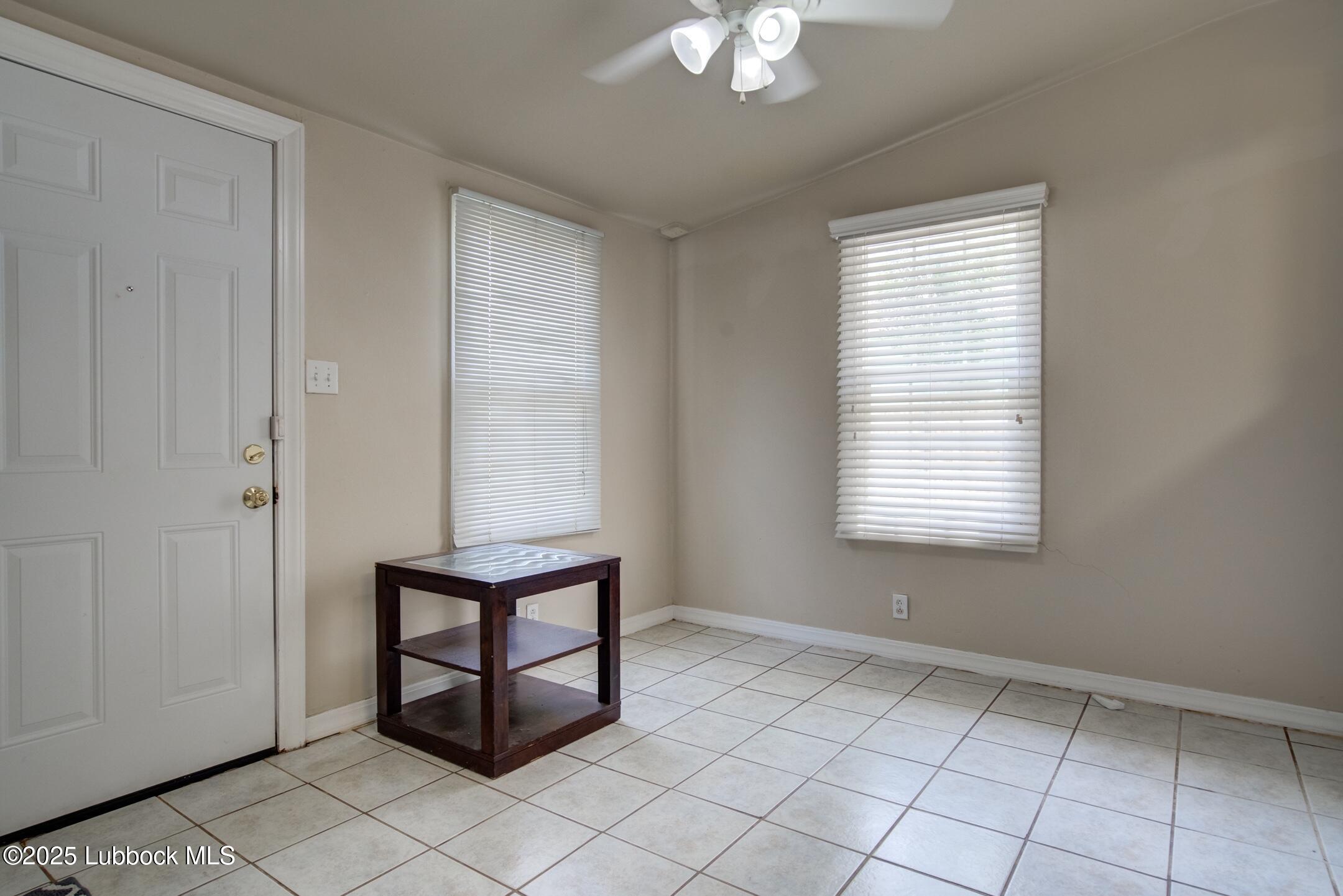 2308 28th Street Lubbock, TX 79411 - Photo 6 of 21 a view of an entryway with a window