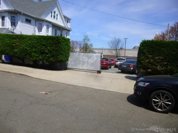 a view of a street with cars
