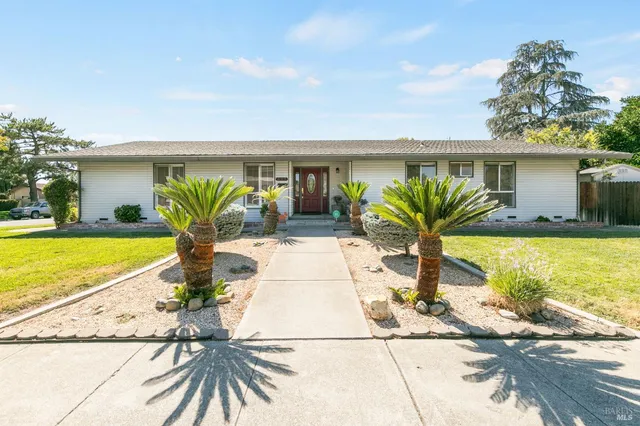 a view of a house with garden