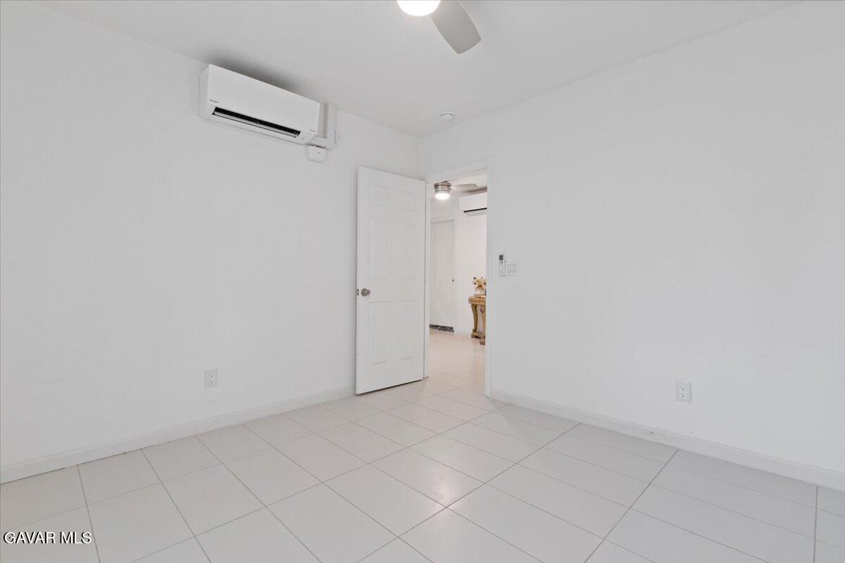 4706 Spice Street, Unit 2 Lancaster, CA 93536 - Photo 12 of 14 wooden floor in an empty room
