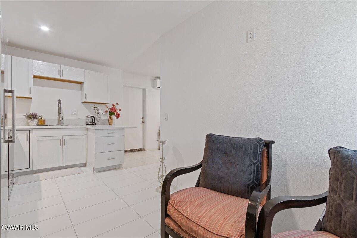 4706 Spice Street, Unit 2 Lancaster, CA 93536 - Photo 8 of 14 a living room with furniture