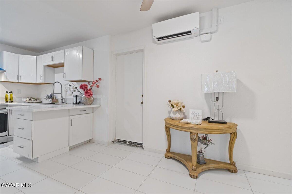 4706 Spice Street, Unit 2 Lancaster, CA 93536 - Photo 10 of 14 a room with storage and utility