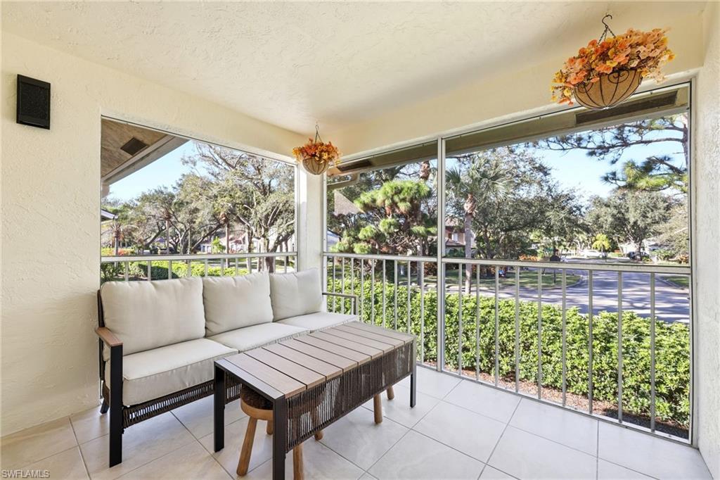 7707 Jewel Lane, Unit 201 Naples, FL 34109 - Photo 18 of 31 View of sunroom / solarium