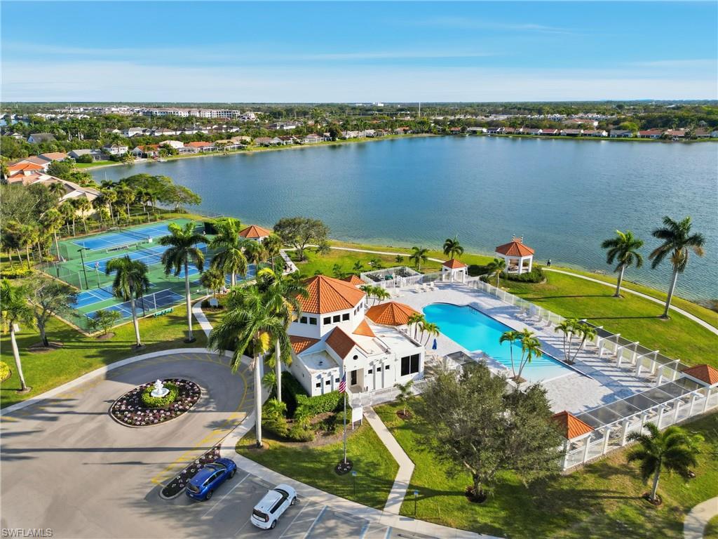 7707 Jewel Lane, Unit 201 Naples, FL 34109 - Photo 28 of 31 Aerial view of a large body of water and a pool area