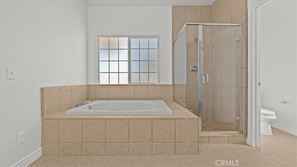 7536 Sunset Road Phelan, CA 92371 - Photo 20 of 40 a bathroom with a sink a toilet and shower