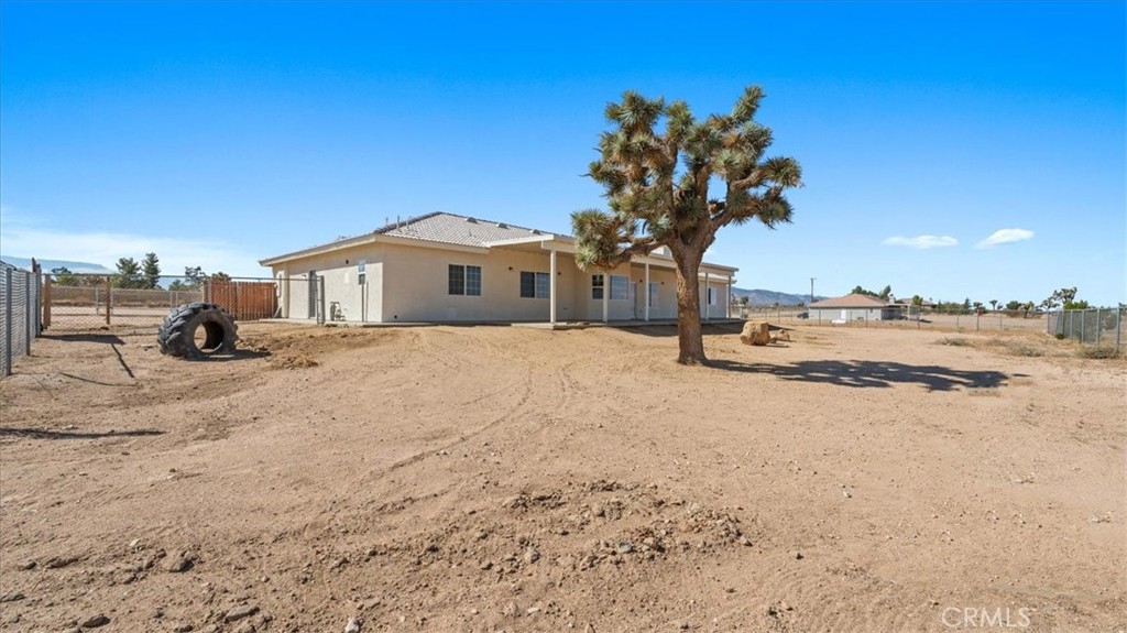 7536 Sunset Road Phelan, CA 92371 - Photo 32 of 40 a view of a house with a snow on the road
