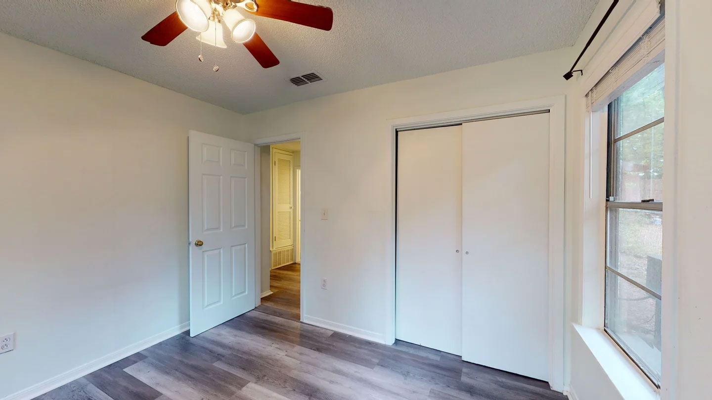 1109 Gardner Cove Austin, TX 78721 - Photo 9 of 13 A quiet retreat with durable flooring and ample storage awaits.