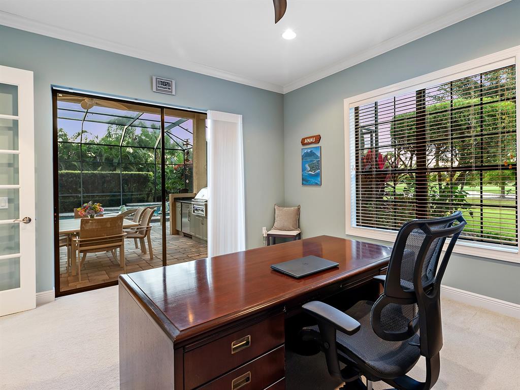 15207 Camargo Place Lakewood Ranch, FL 34202 - Photo 42 of 96 a view of a dining room with a table and chairs
