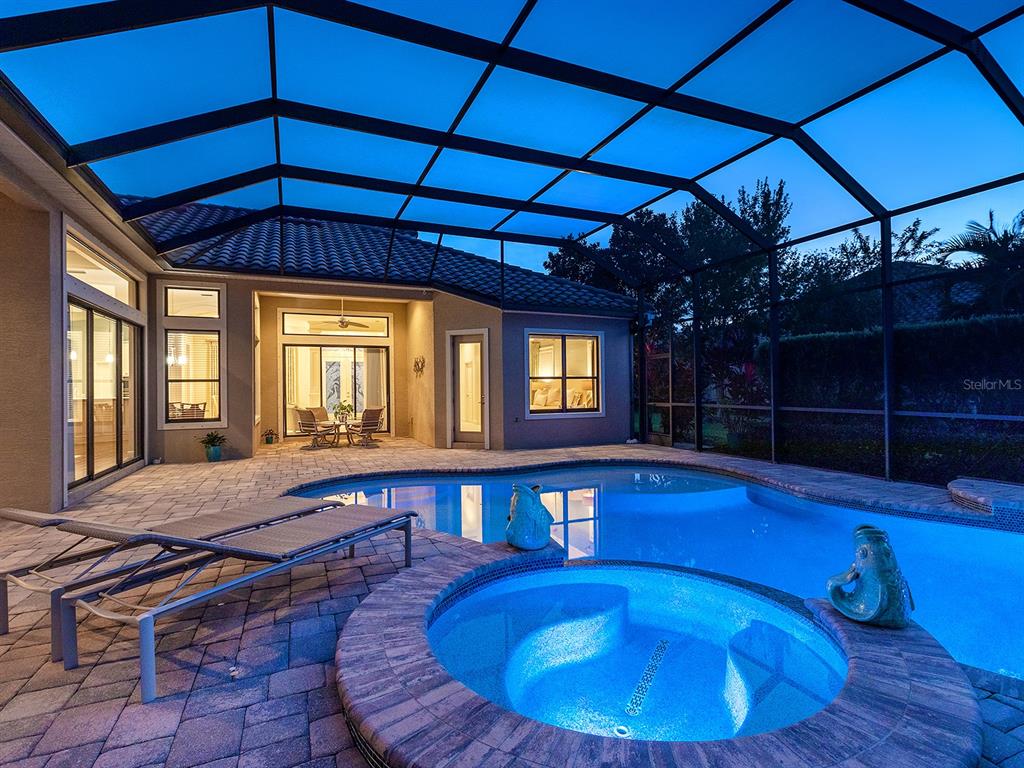 15207 Camargo Place Lakewood Ranch, FL 34202 - Photo 59 of 96 a view of a room with wooden floor and pool table