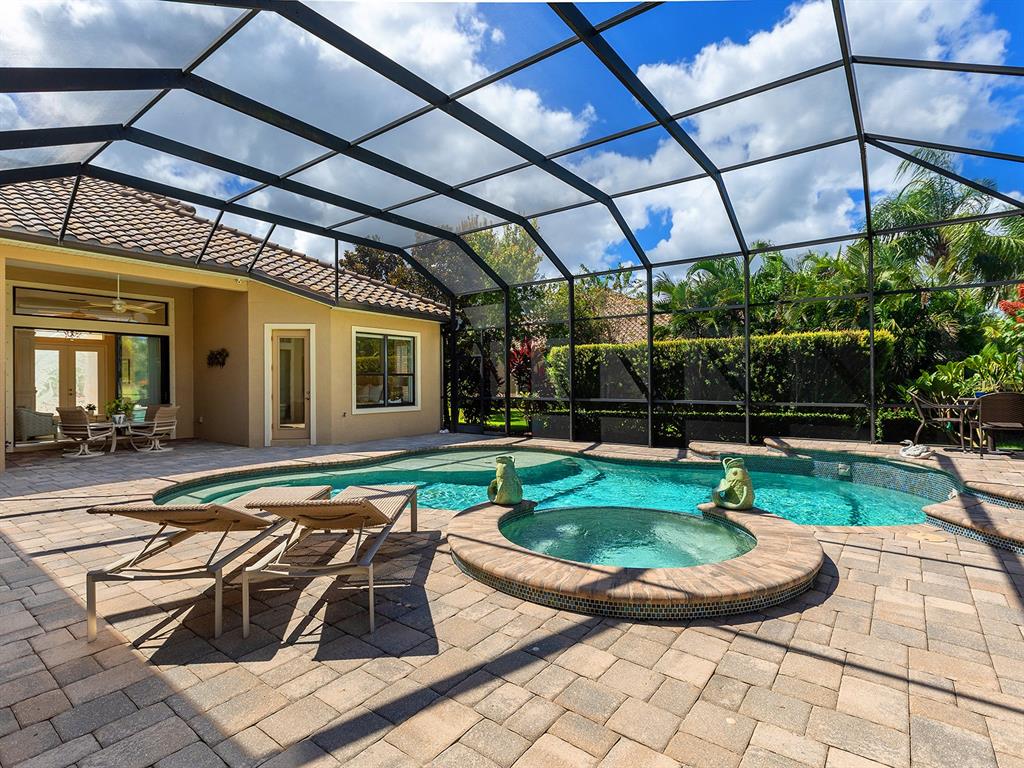 15207 Camargo Place Lakewood Ranch, FL 34202 - Photo 62 of 96 a view of a backyard with furniture and tub