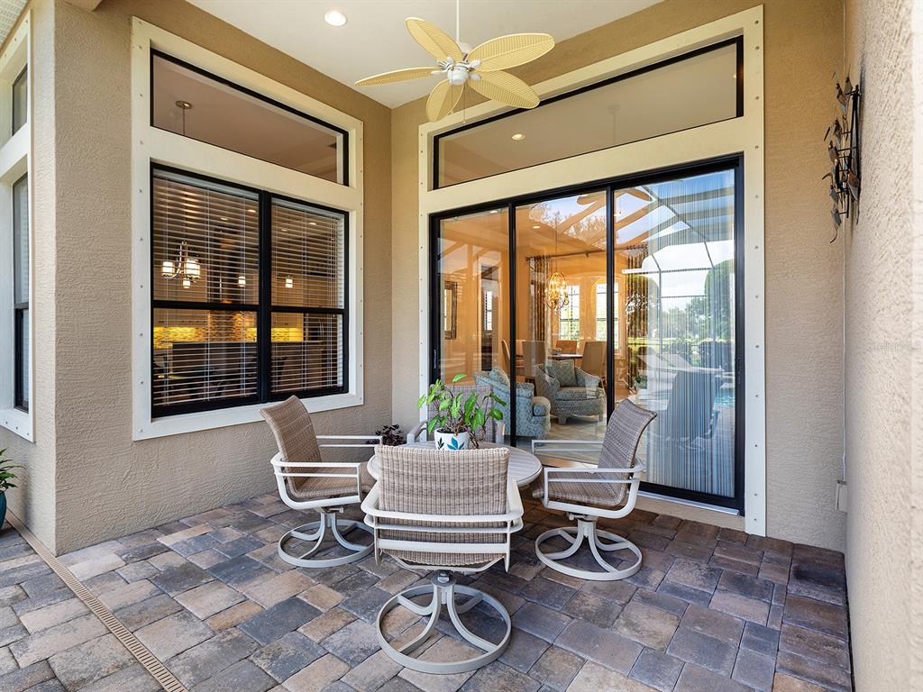 15207 Camargo Place Lakewood Ranch, FL 34202 - Photo 68 of 96 a living room with a large window