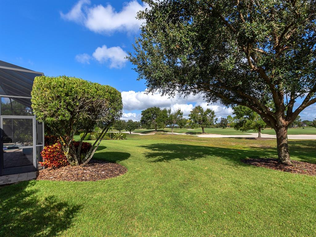 15207 Camargo Place Lakewood Ranch, FL 34202 - Photo 69 of 96 a view of a garden