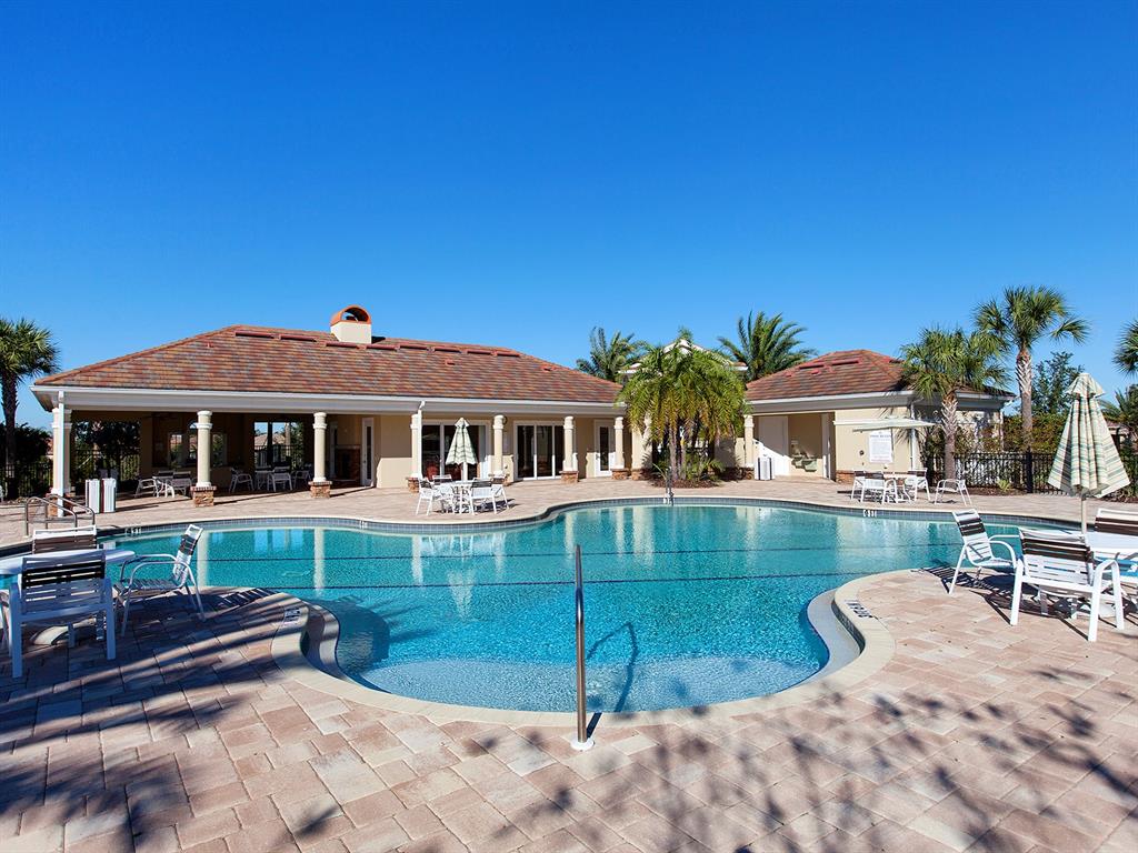 15207 Camargo Place Lakewood Ranch, FL 34202 - Photo 91 of 96 a front view of house with yard and entertaining space