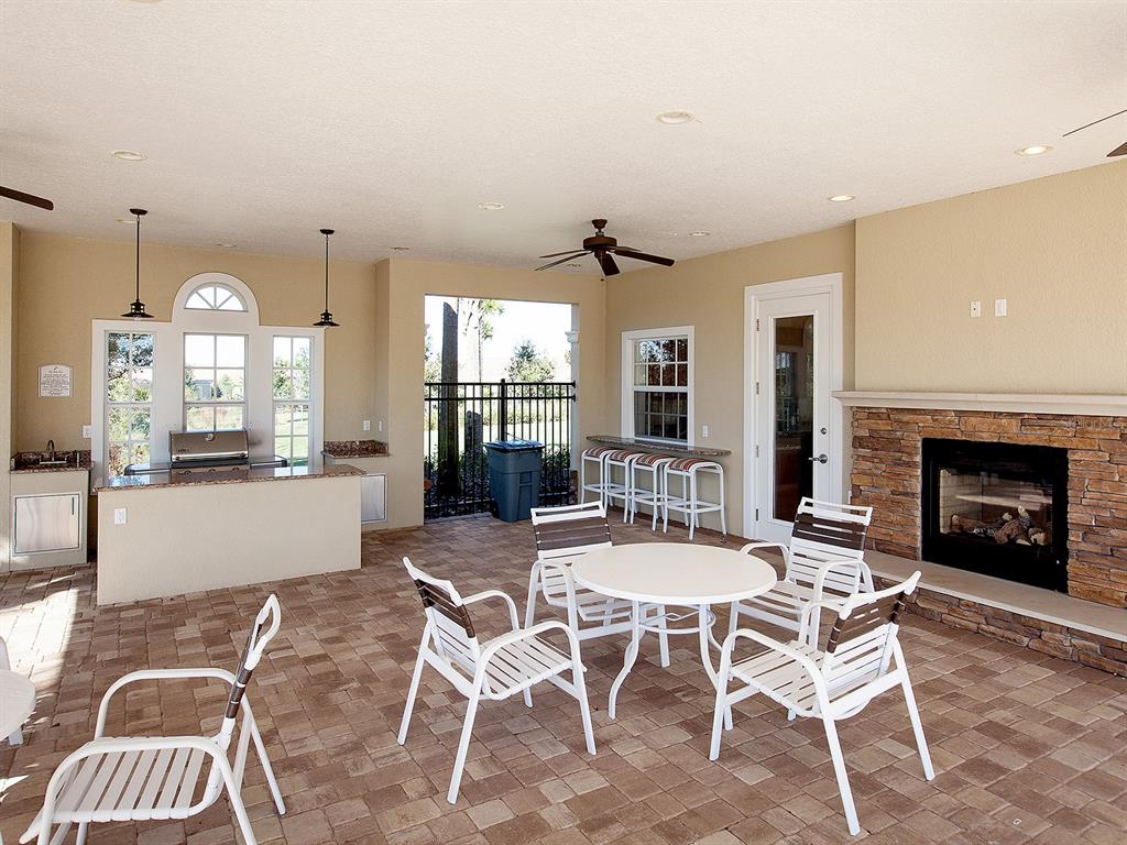15207 Camargo Place Lakewood Ranch, FL 34202 - Photo 93 of 96 a dining room with furniture and window