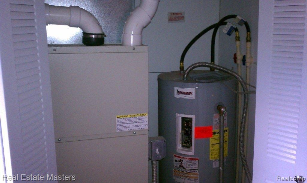 7373 Frith Road St. Clair, MI 48079 - Photo 19 of 19 MECHANICALS IN LAUNDRY ROOM