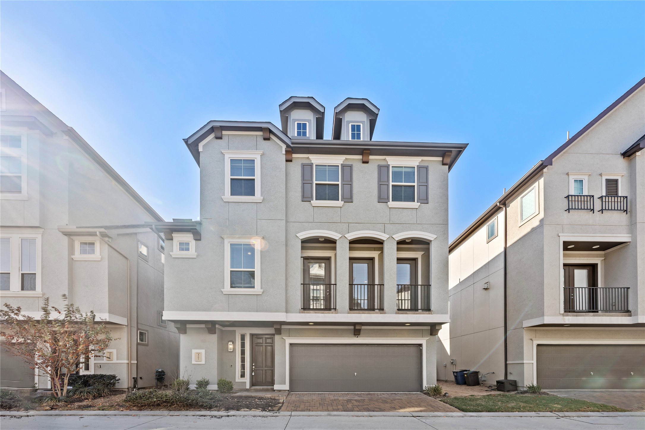 a front view of a building with balcony