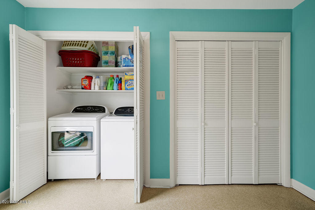 157 Olde Point Road Hampstead, NC 28443 - Photo 26 of 40 Lotsof storage in the laundry room