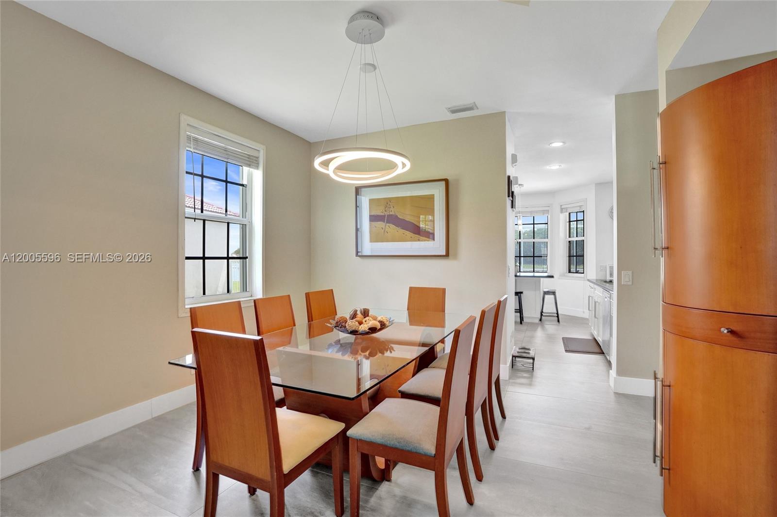 4281 Laurel Ridge Circle Weston, FL 33331 - Photo 18 of 80 a dining room with furniture and a window