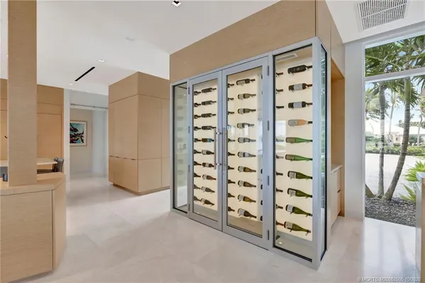 a kitchen with stainless steel appliances a microwave and a refrigerator