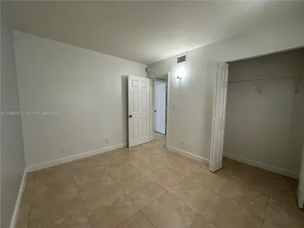 an empty room with a natural light