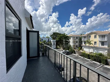 a view of a street from a balcony