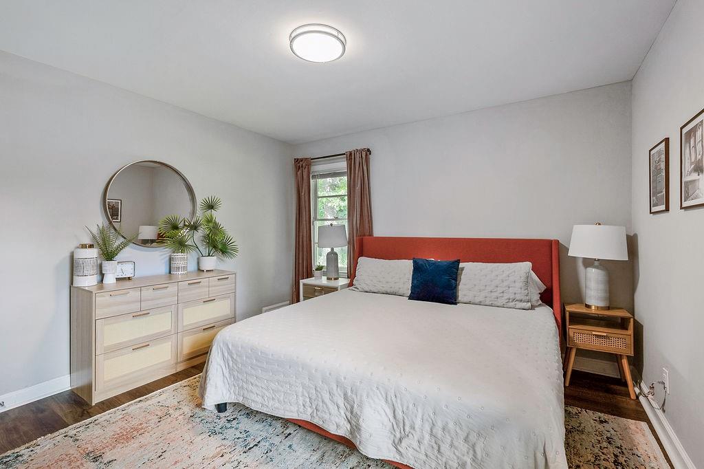 1140 Allgood Road Stone Mountain, GA 30083 - Photo 17 of 25 a bedroom with a bed and a dresser