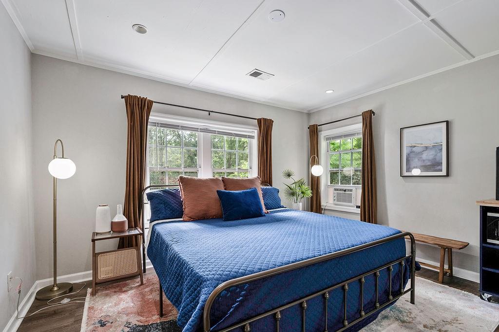 1140 Allgood Road Stone Mountain, GA 30083 - Photo 22 of 25 a bedroom with a large bed and a window