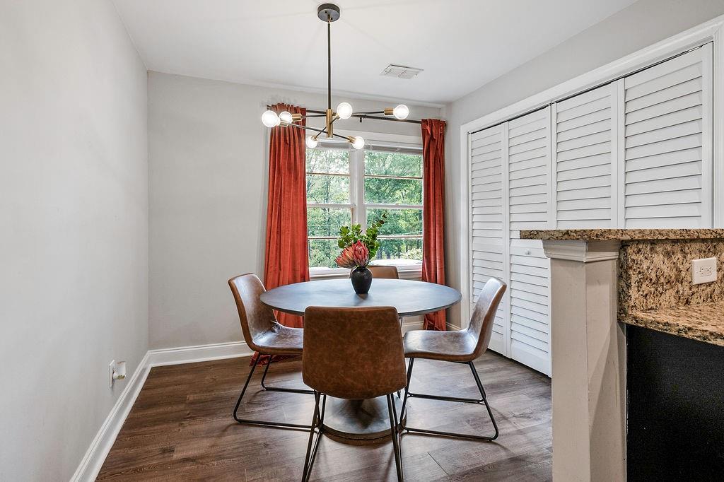 1140 Allgood Road Stone Mountain, GA 30083 - Photo 9 of 25 a view of a dining room with furniture window and outside view