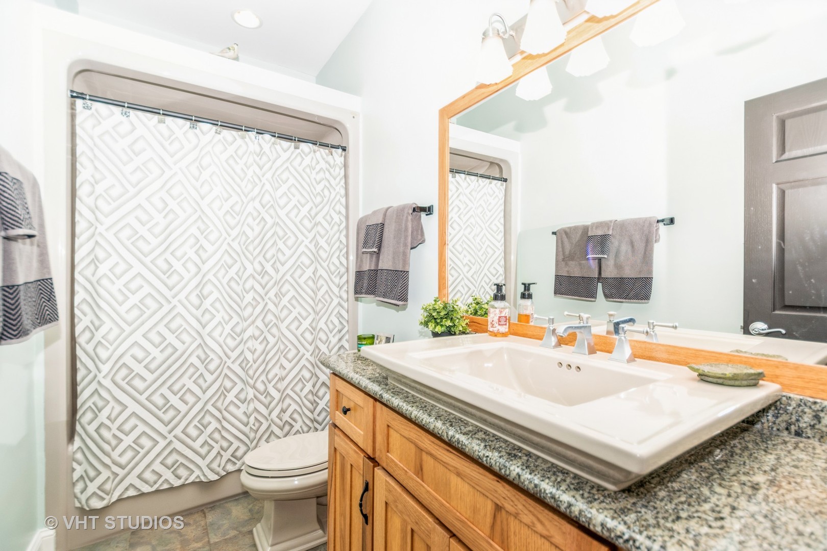 9424 West Pauling Road Monee, IL 60449 - Photo 12 of 19 a bathroom with a sink toilet and shower